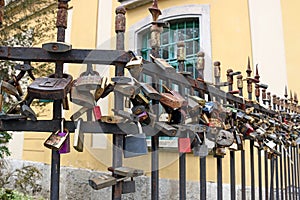 Love locks on iron fence