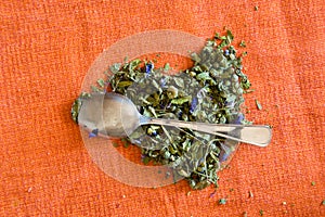 Love for mallow herbal tea with spoon