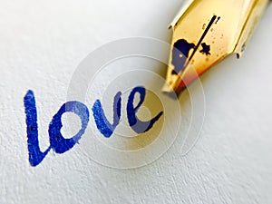 Love message with pen