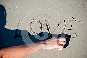 Love message written in sand