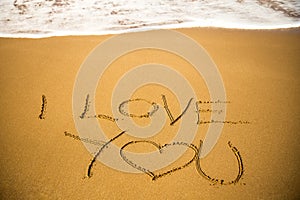 Love message written in sand