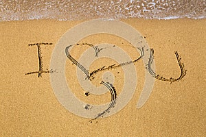 Love message written in sand