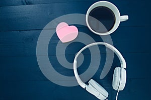 Love music concept with pink love heart shape and white headphones