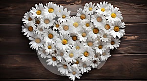 Love in nature: composition of white daisies in the shape of hearts on a dark wooden background