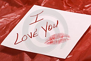 Love note on red gift wrap