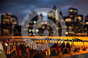 Love padlocks with city as a background