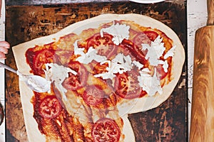 Love pizza. Baked heart-shaped homemade pizza