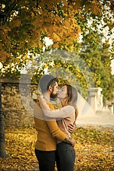 Love relationship and romance. Autumn happy couple of girl and man outdoor