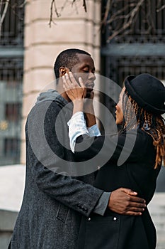 Love relationships. Black couple gentle touch