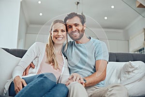 Love, relax and portrait of couple on sofa enjoying quality time together on weekend, vacation and holiday. Relationship