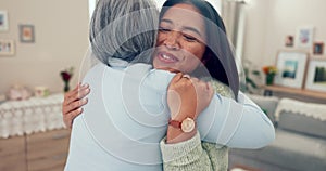 Love, retirement and a senior asian woman hugging her daughter in the living room of a home during a visit. Family