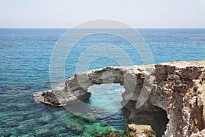 Love rock bridge arch. Cavo greco cape, Ayia napa, Cyprus. photo