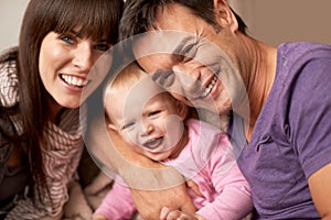 Love, selfie and baby with parents in a house for bonding, support or having fun together. Happy family, portrait and
