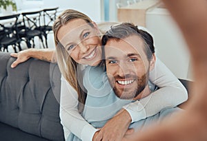 Love, selfie and couple on sofa, smile and bonding for relationship, weekend break and romance. Portrait, man and woman