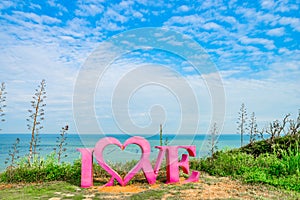 LOVE sign on the romantic seaside