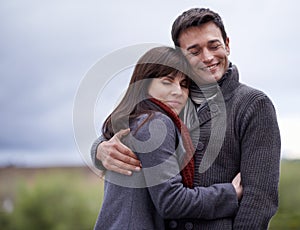 Love, smile and hug with couple in countryside together for weekend bonding or romantic date. Environment, nature or