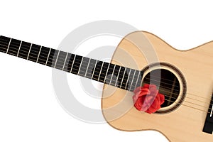 Love song. Acoustic guitar with red rose. Romantic music concept image