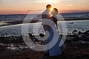 Love story couple wedding on sunset sea. Outdoor