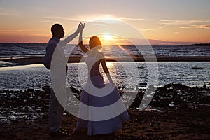 Love story couple wedding on sunset sea. Outdoor
