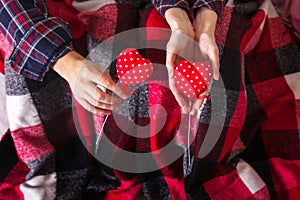 Love story Romance Couple plaid shirts holding red hands two hearts young loving man woman Valentine day