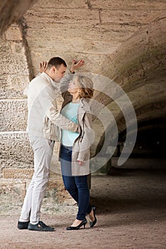 Love story. Romantic couple in relationship in park, garden. Autumn