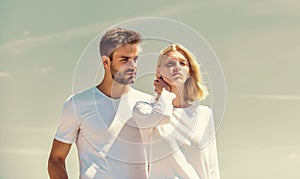 Love story. Romantic relations. Couple in love blue sky background. Man and woman white clothes sunny day outdoors. True