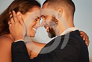 Love, summer and couple bonding on a beach holiday, embracing in intimate moment at sunset. Happy, face and man and