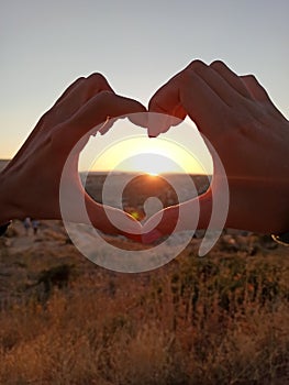 Love sunset cappadocia arms