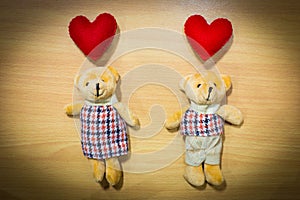 Love teddy bear couple on wooden , valentine day concept