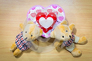 Love teddy bear couple on wooden , valentine day concept