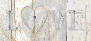 love text with heart shape on wood planks grunge texture background