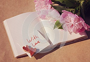 With love. Two hearts on the white card for an inscription 