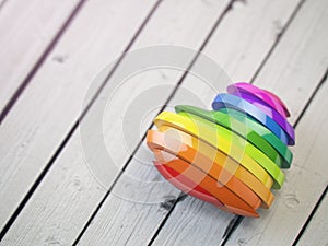 Love valentine rainbow heart on a white wood background. Pride c photo