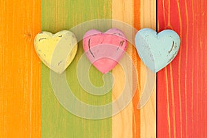 Love Valentine's Hearts on Wooden Texture Painted Board Backgrou