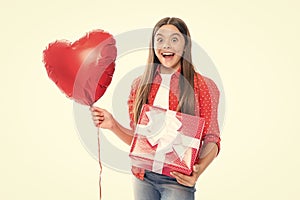 Love valentines day. Teenager kid with present box. Teen girl giving birthday gift. Present, greeting and gifting photo
