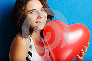 Love and valentines day woman holding heart smiling cute and ado