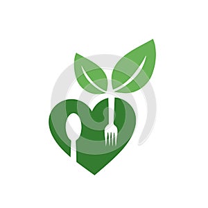 Love for vegan food- logo with organic leaves and spoon forks for organic Vegetarian friendly diet photo