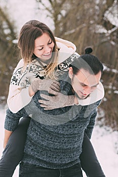 Love winter couple, hugging and kissing outdoor