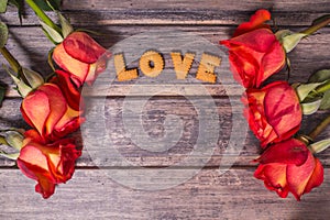 Love on the wooden background. Copy space