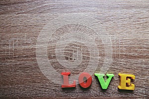 `love` word Close-up shot with a selective focus of the colorful magnetic letters for Valentine`s Day