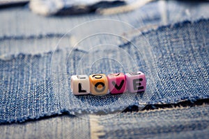 Love word on a jeans