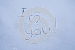 Love you lettering in the snow. Valentine\'s Day. The 14th of February. Valentine\'s day mood concept.