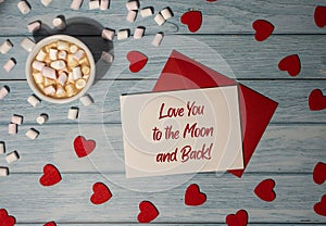 LOVE YOU TO THE MOON AND BACK text on valentine card inscription positive quote, motivation and inspiration phrase