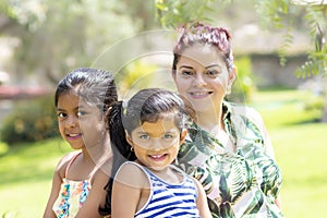 Love between a young mother and her two pretty daughters