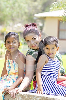 Love between a young mother and her two pretty daughters