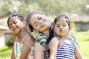 Love between a young mother and her two pretty daughters