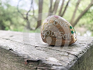 Love yourself wellbeing stone