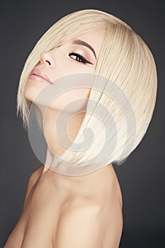 Lovely asian woman with blonde short hair