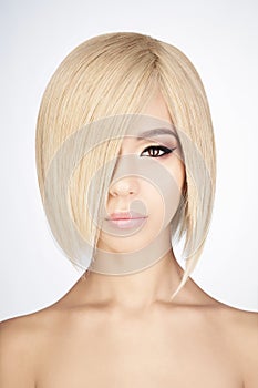 Lovely asian woman with blonde short hair