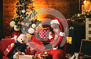 Lovely baby enjoy christmas. Family holiday. Boy cute child cheerful mood play near christmas tree. Merry and bright